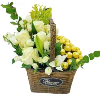 Al Mubarraz blomster- Hvite roser og Ferrero Rocher Blomst Levering